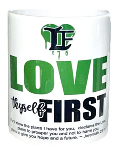 Mug with motivational quote and branding on a white background